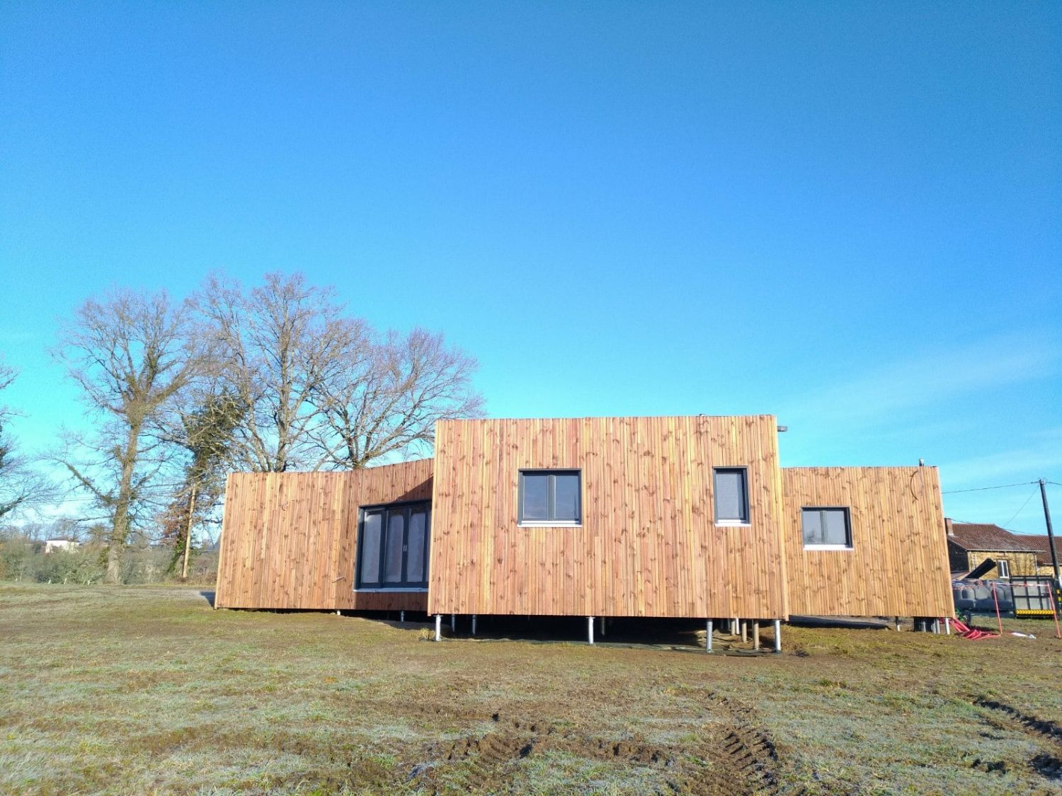 Maison à ossature bois de plain-pied, bardage bois